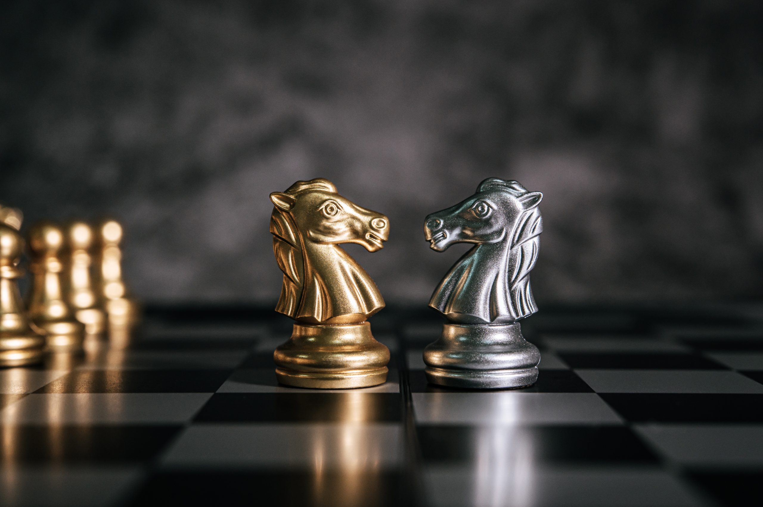 Gold And Silver Chess On Chess Board Game For Business Metaphor